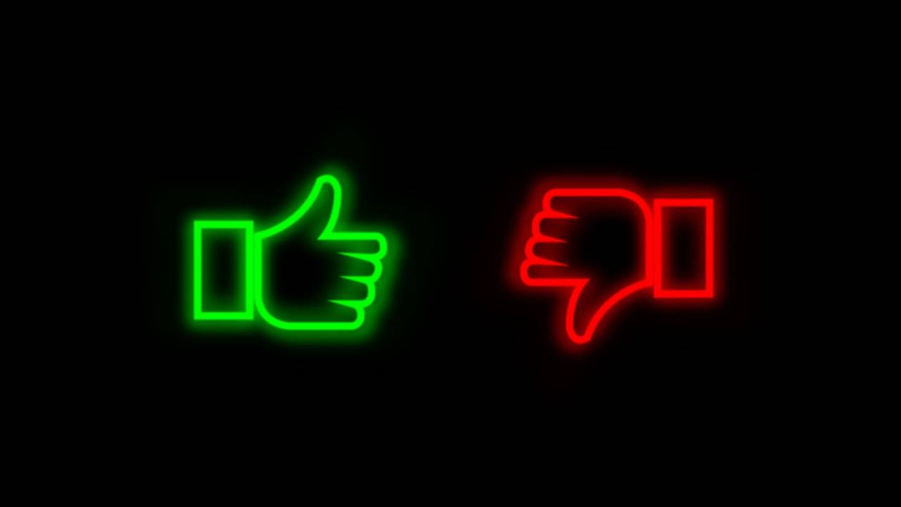2 iconos de pulgar para arriba verde y pulgar para abajo rojo